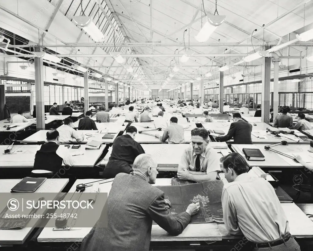 Vintage photograph. Scene of the engineering department of caterpillar tractor Co.