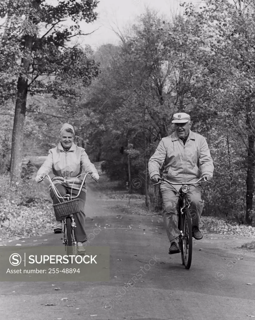 Senior couple riding bicycles