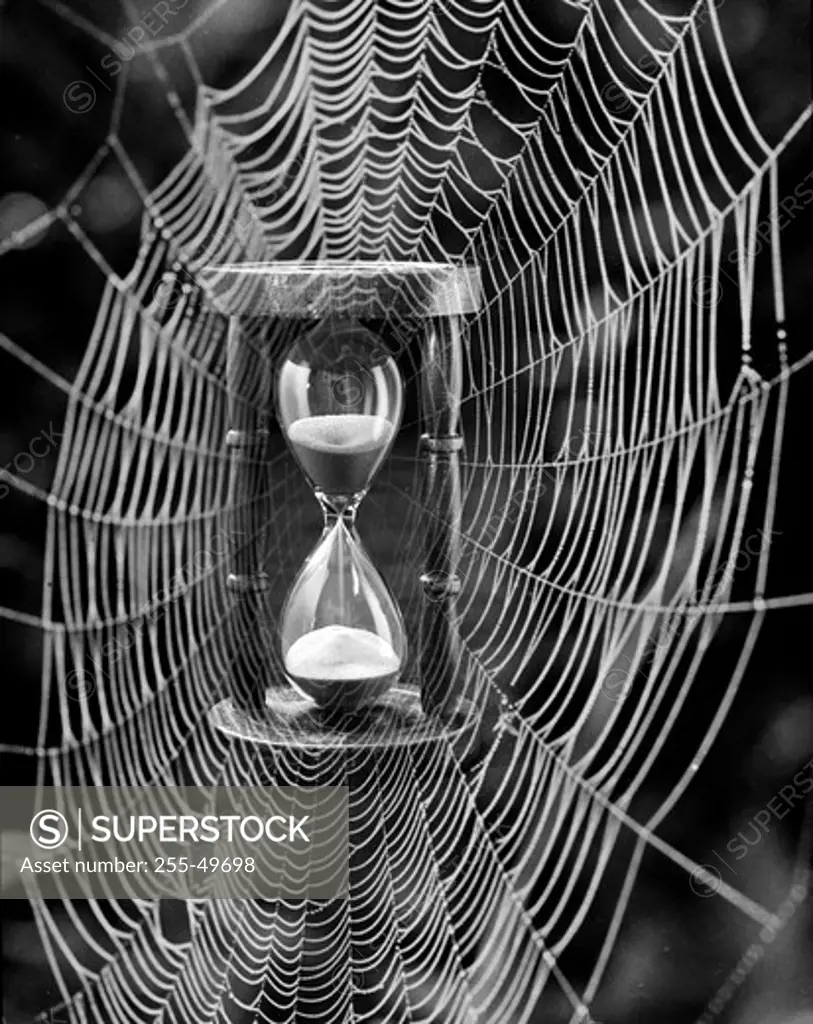 Hourglass in spider web