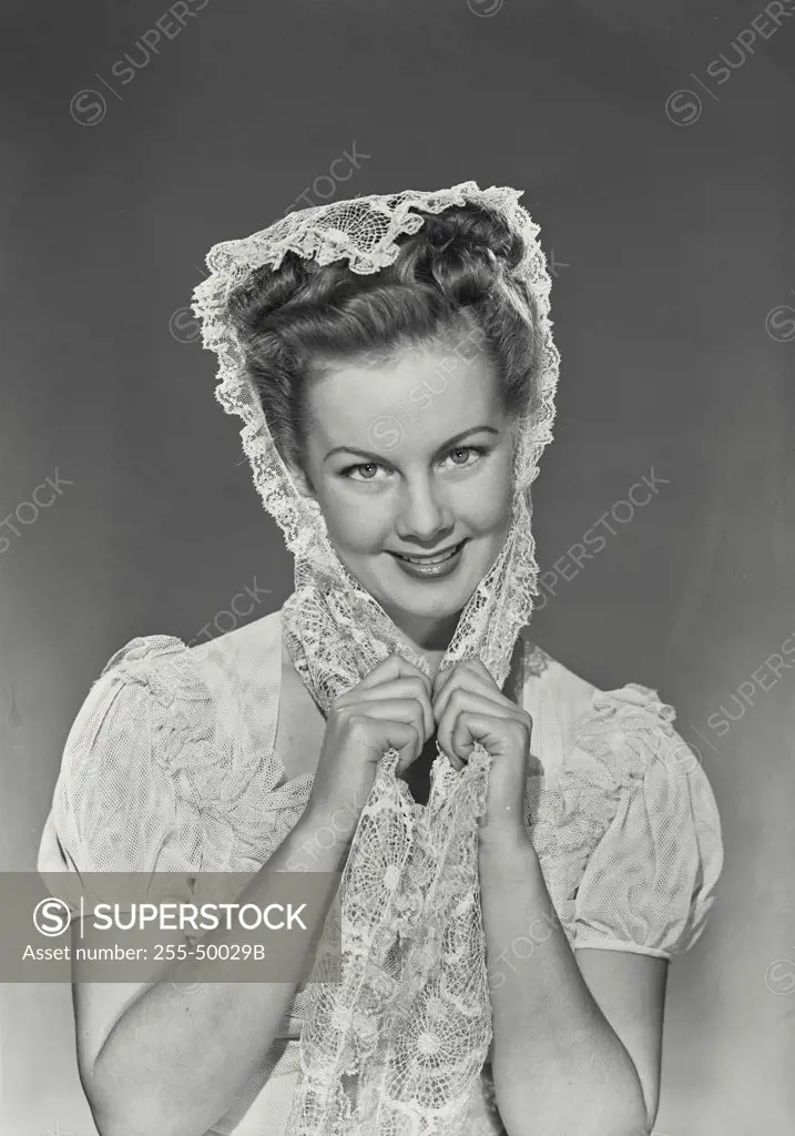 Vintage photograph. Portrait of a young woman smiling