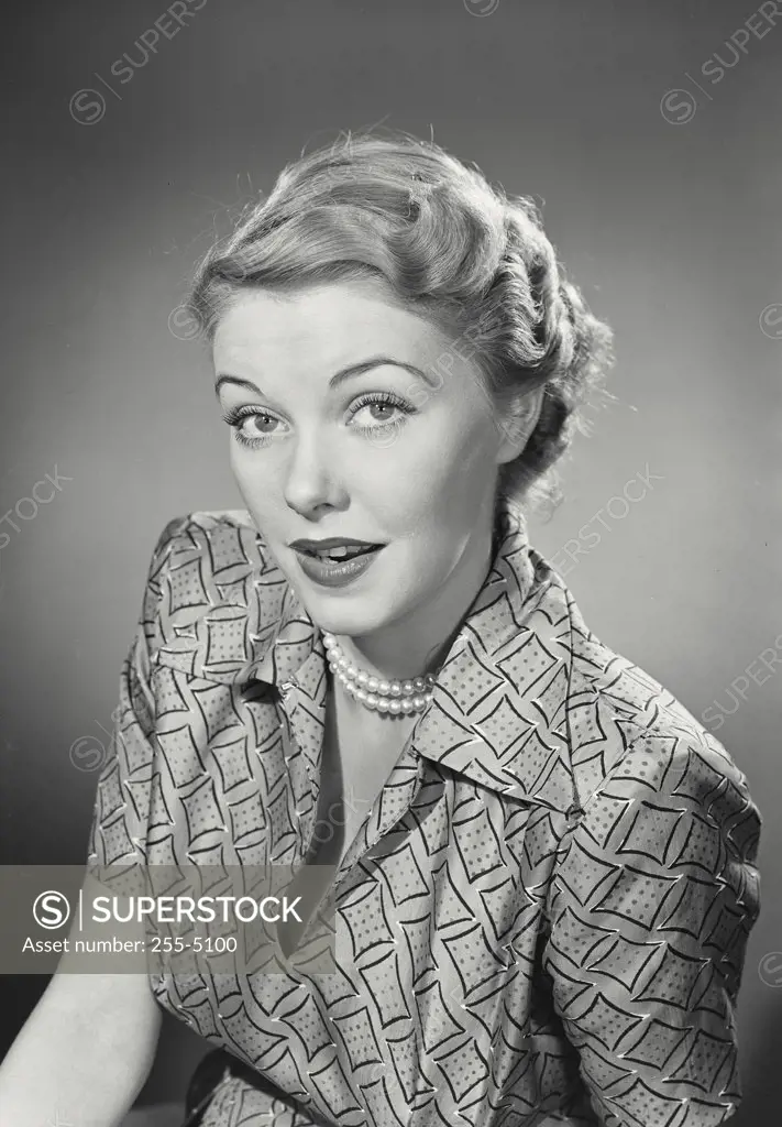 Vintage photograph. Portrait of woman in patterned blouse