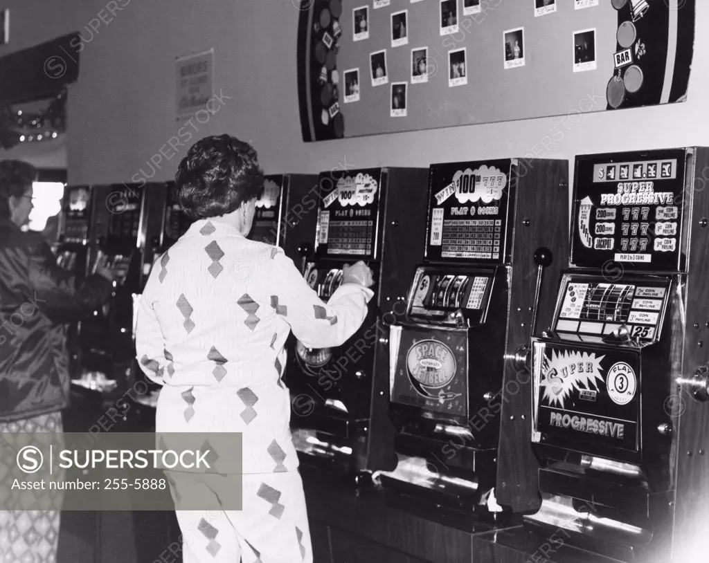 Women playing slot machines in a casino, Las Vegas, Nevada, USA