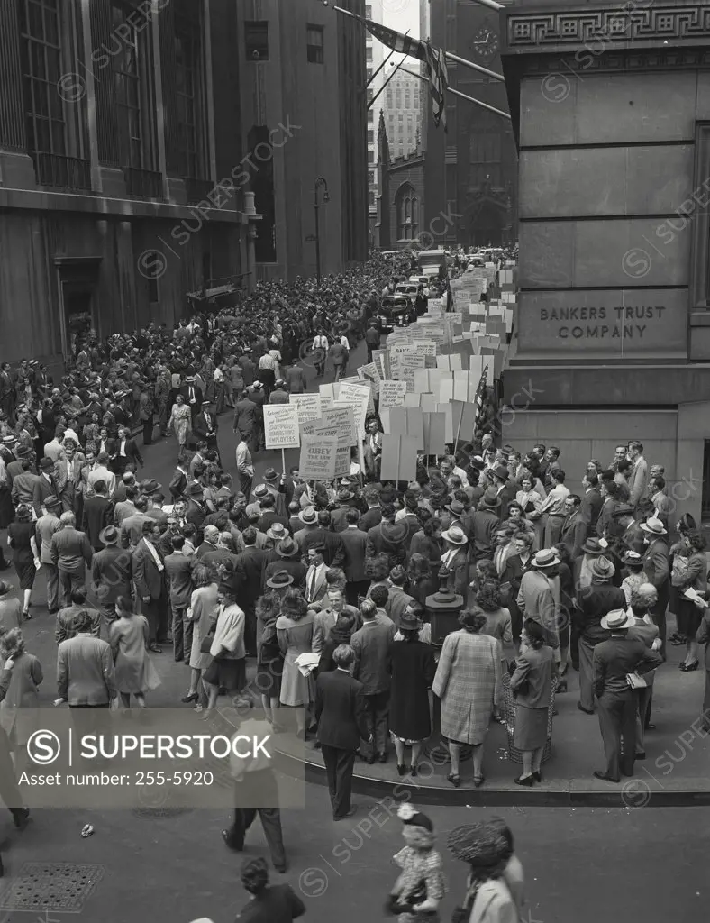 Vintage photograph. People protesting outside of Bankers Trust Company