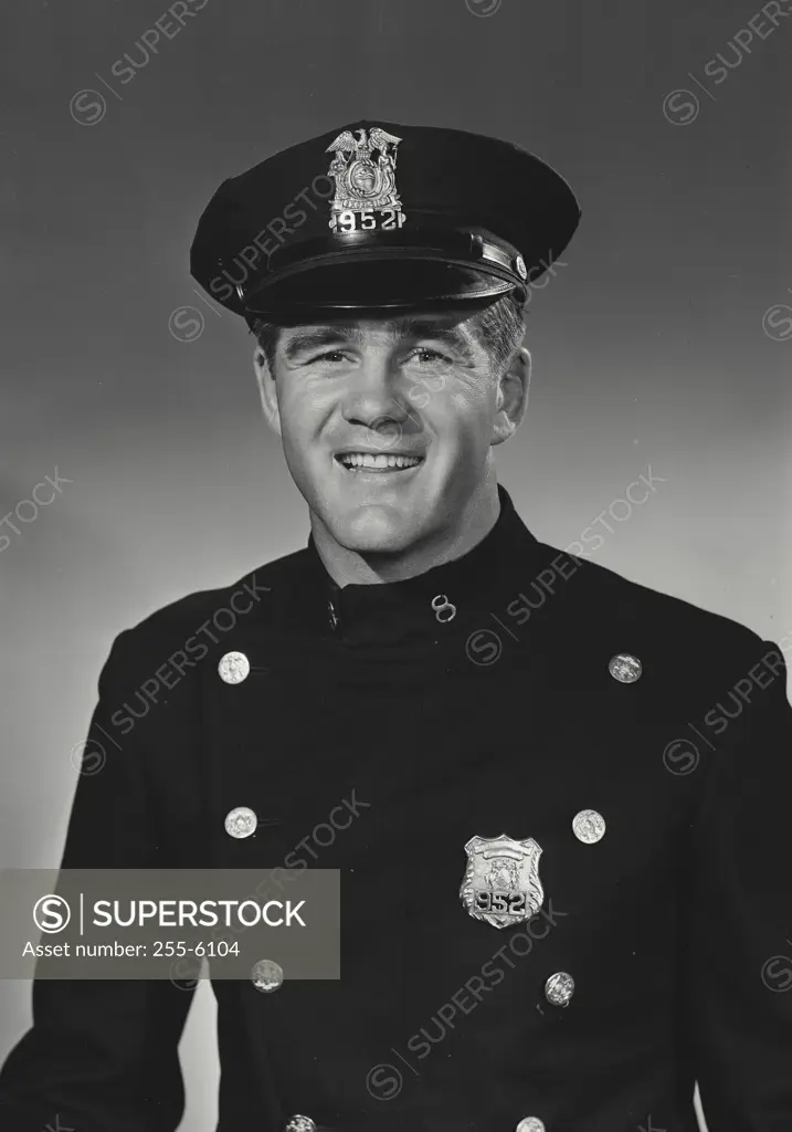 Vintage Photograph. Police officer smiling at camera