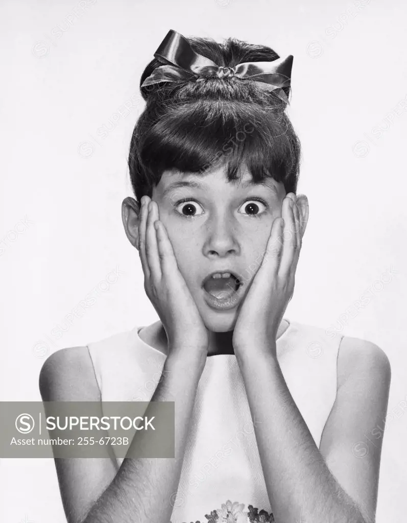 Portrait of a girl looking surprised