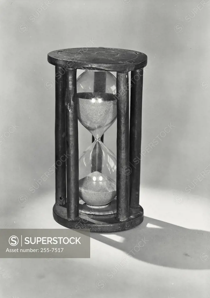 Vintage photograph. Antique hourglass