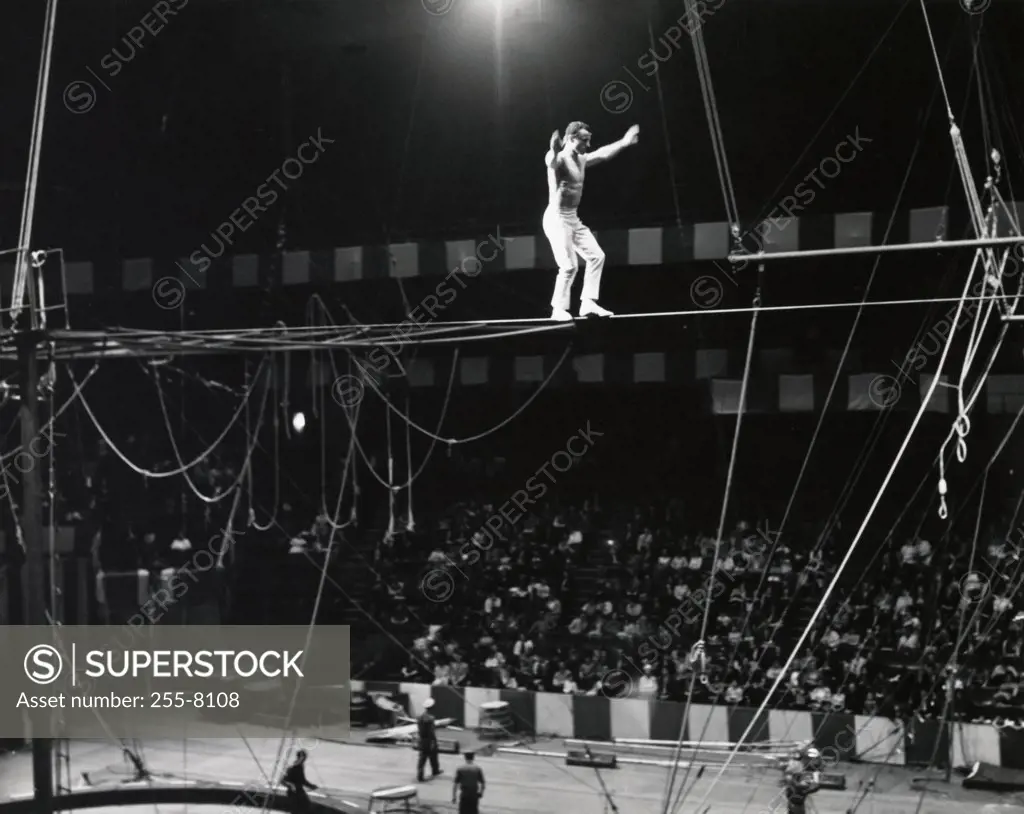 Tightrope walker performing in a circus