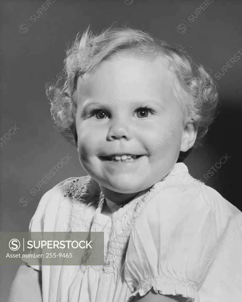 Portrait of a baby girl smiling