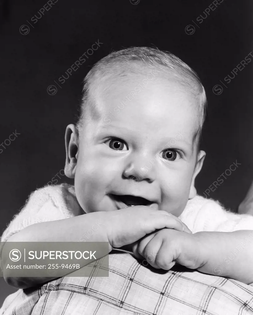 Portrait of baby boy smiling