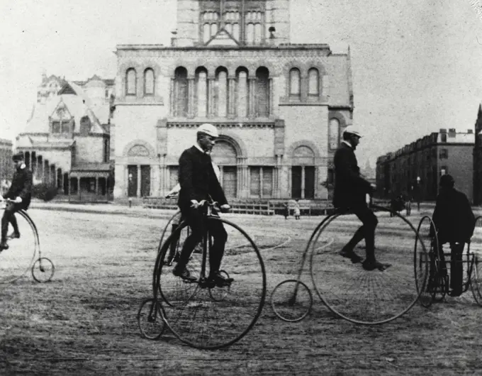 Vintage Photograph. Four people riding bicycles, Boston, Massachusetts, USA