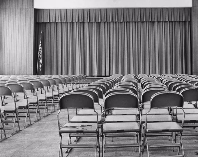 Empty chairs in an auditorium of a school