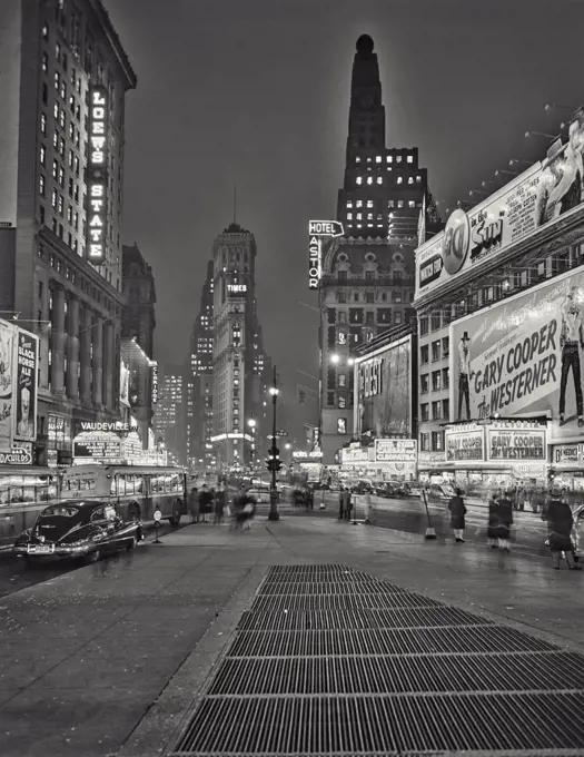 Vintage photograph. Times Square at night with Paramount and Times Square buildings. New York City.
