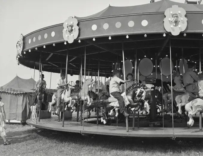Vintage photograph. children on carousel