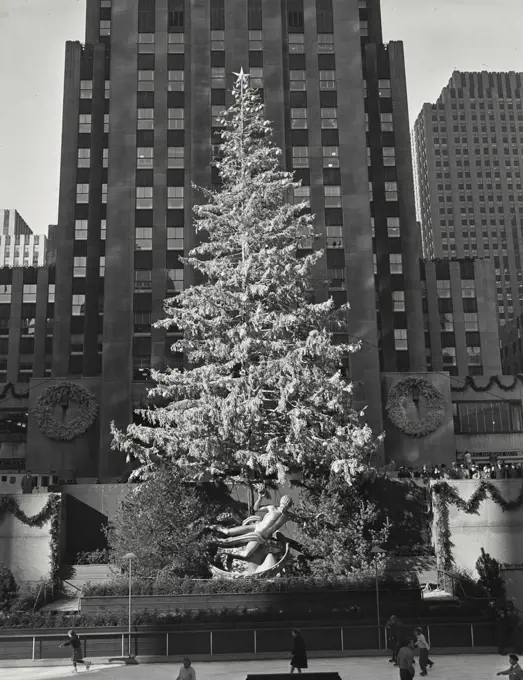 Vintage photograph. Christmas tree scene in plaza. Rockefeller Center