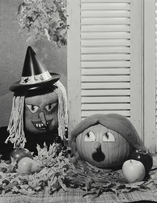 Vintage Photograph. Pumpkins decorated as Halloween decorations. Frame 2