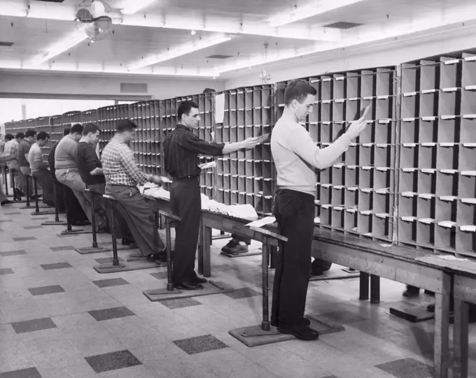 Postal workers sorting mail in a post office, Worchester, Massachusetts, USA