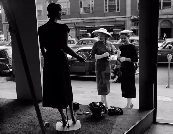 Women looking at window display