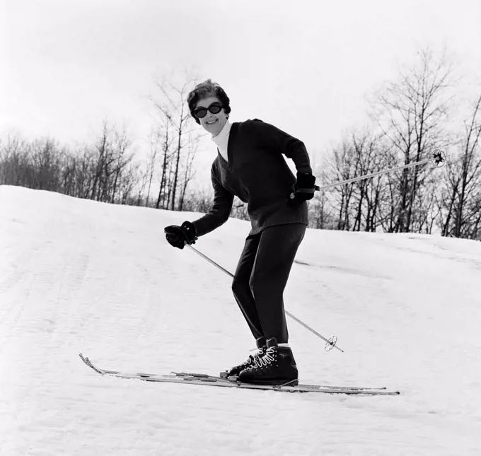 Happy woman skiing