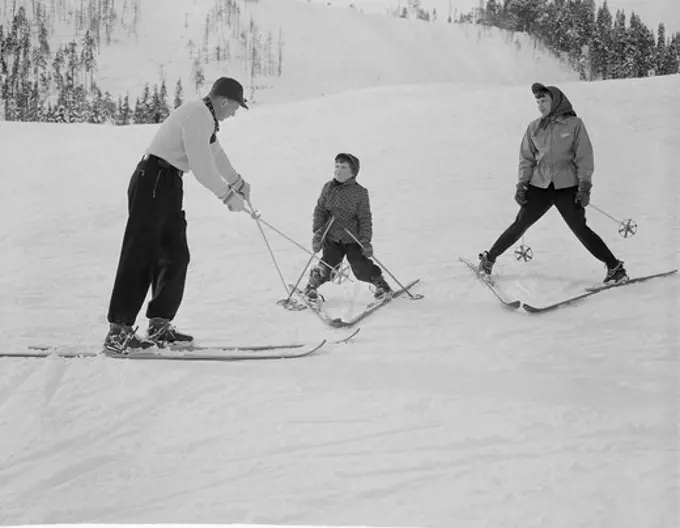 Ski instructor giving lessons