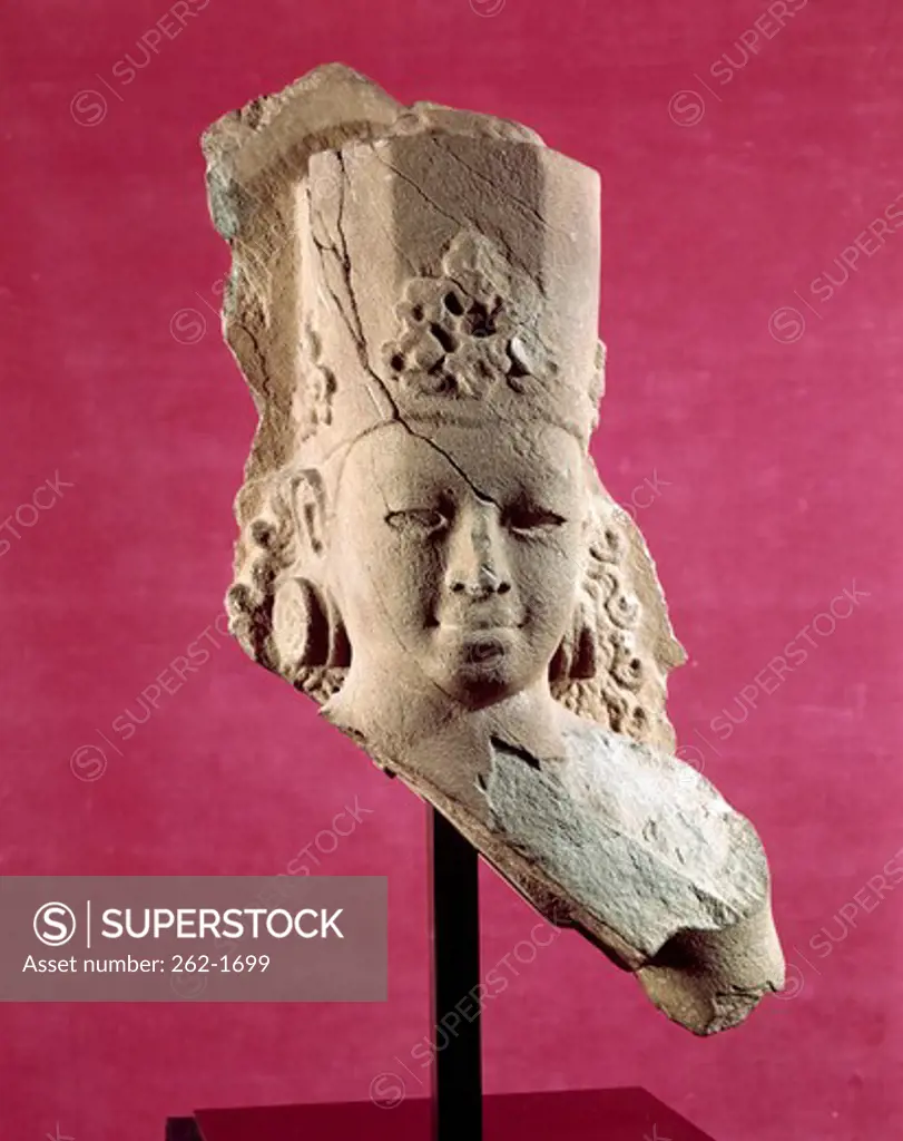 Bust of Surya,  Sri Deb Style,  Cambodian Art,  Sandstone,  7th-8th Century,  Private Collection