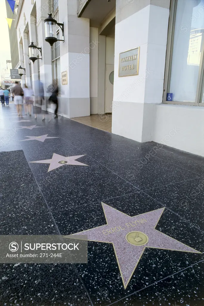 Tourists walking on a street, Walk of Fame, Hollywood, Los Angeles, California, USA