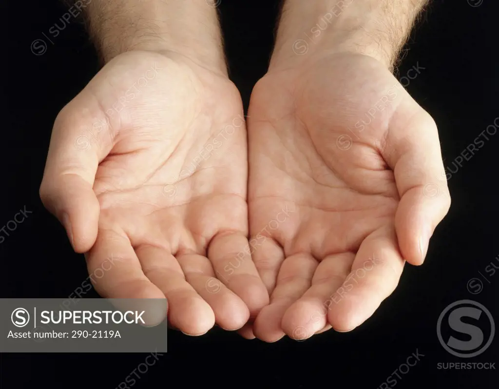 Close-up of a man's hands cupped