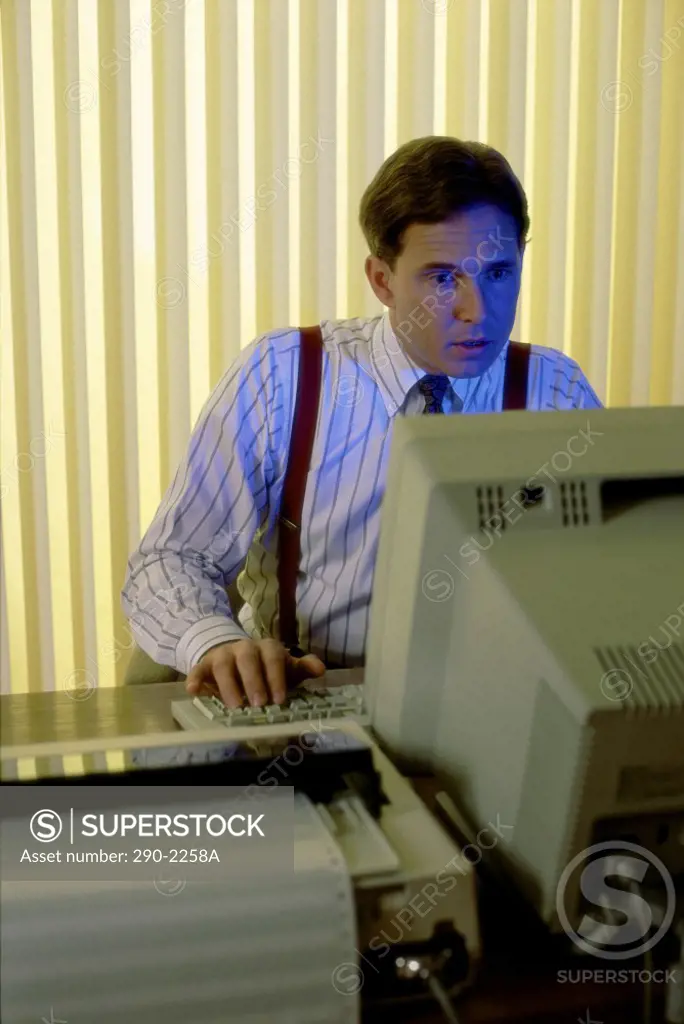 Businessman in front of a computer