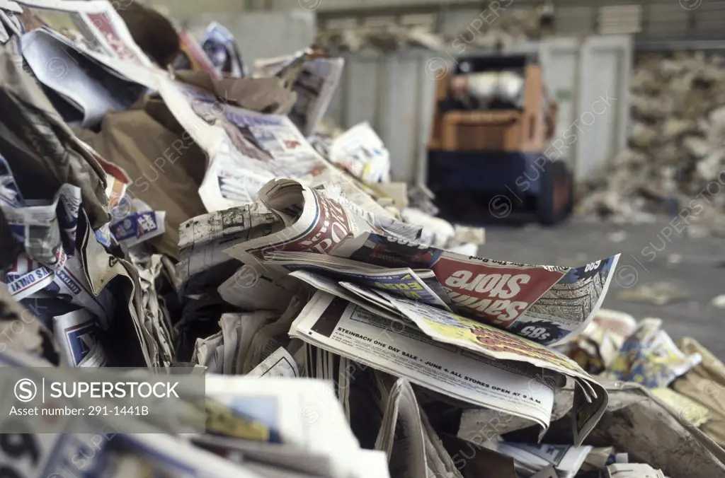 Close-up of a heap of newspapers and magazines