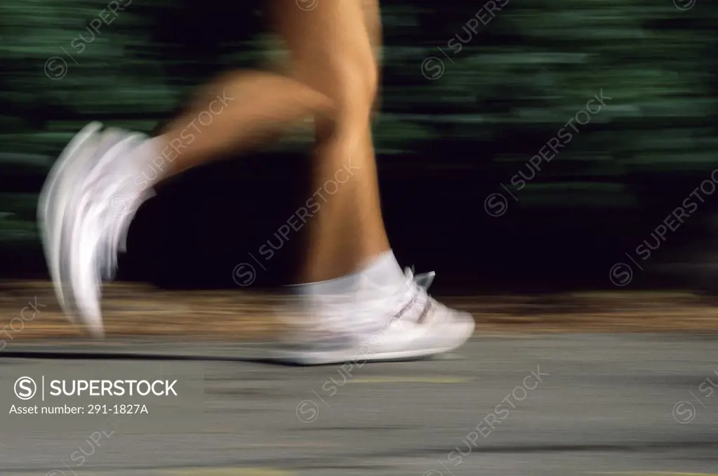 Low section view of a person running