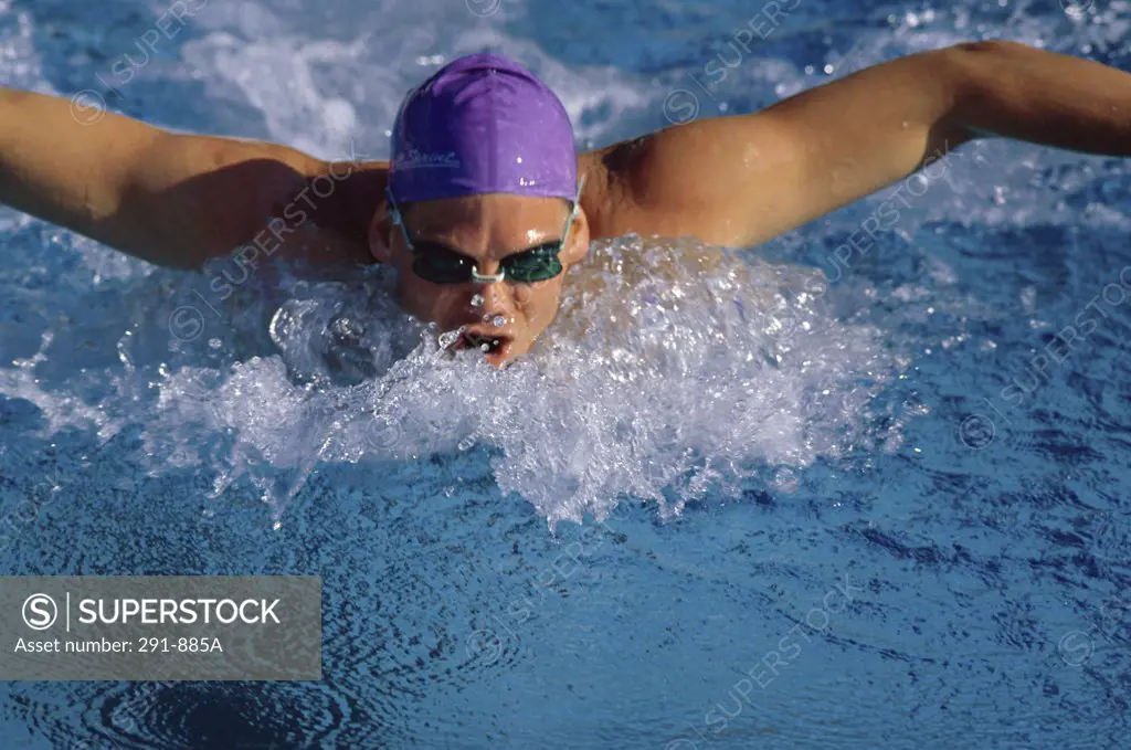 Close-up of a swimmer swimming in a swimming pool