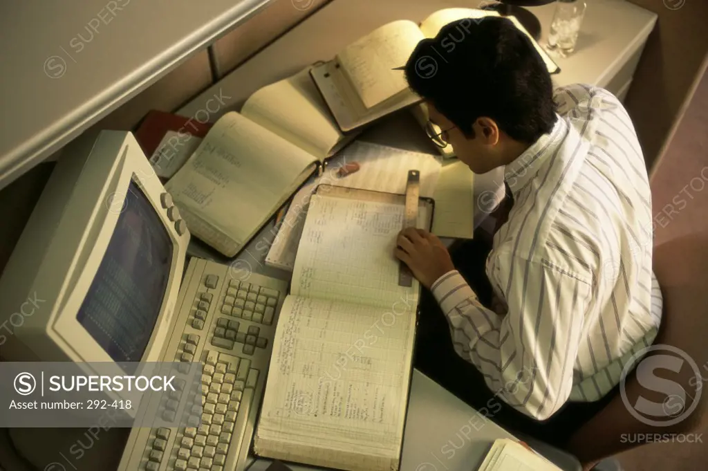 High angle view of a businessman working in an office