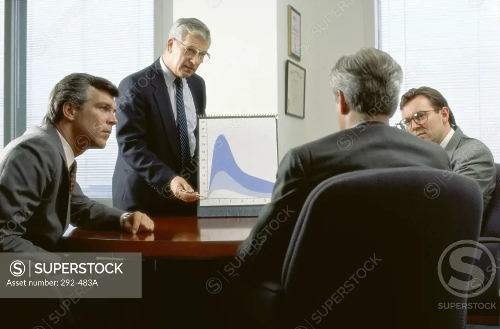 Businessman giving a presentation in an office