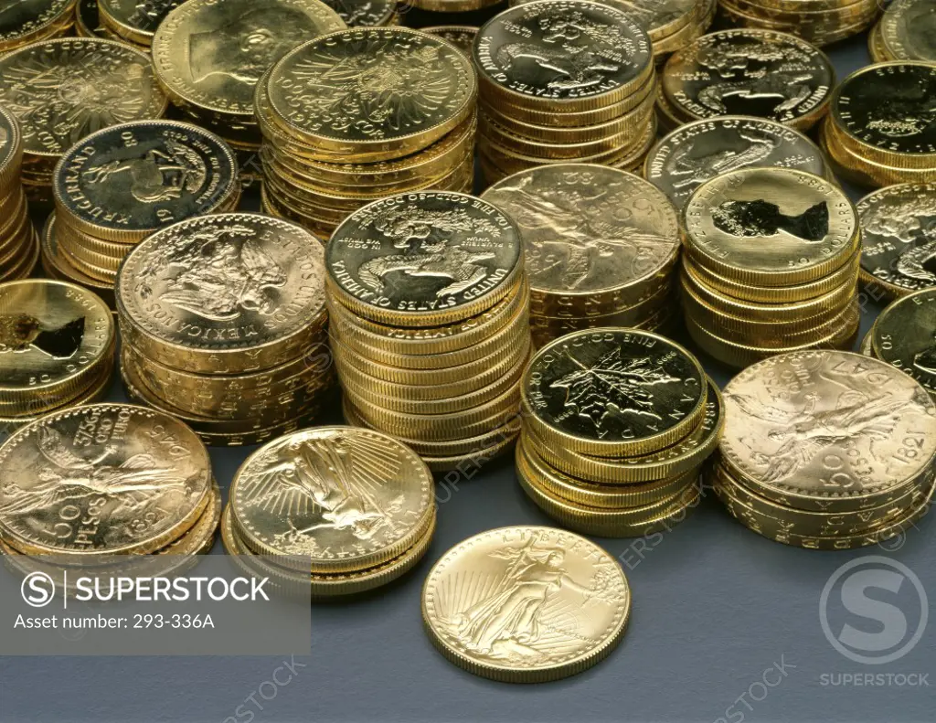 Close-up of stacks of gold coins