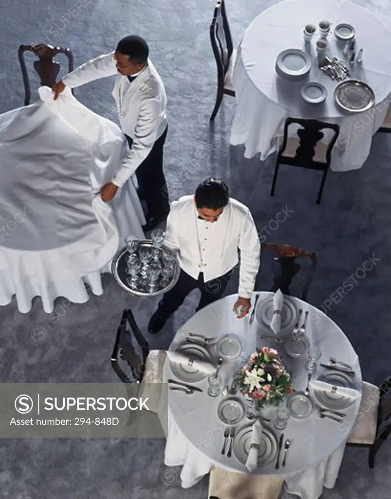 High angle view of two waiters working in a restaurant