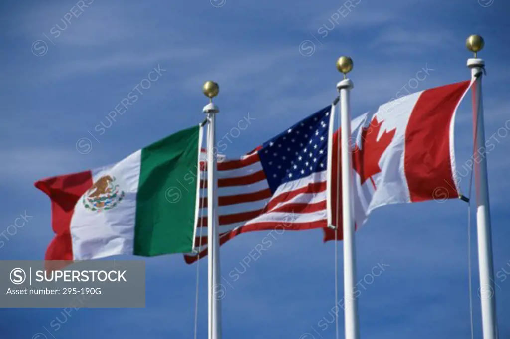 American flag between Mexican and Canadian Flags