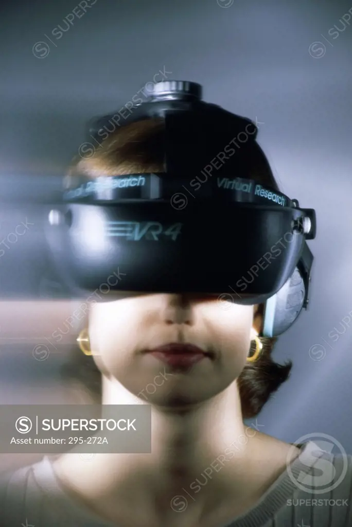 Young woman wearing a Virtual Reality Simulator