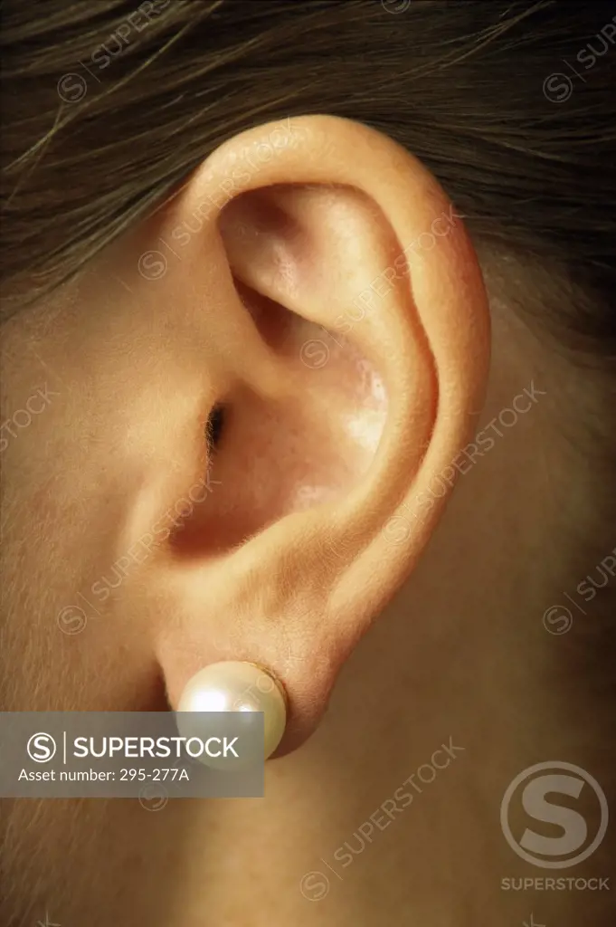 Close-up of an earring on a woman's ear