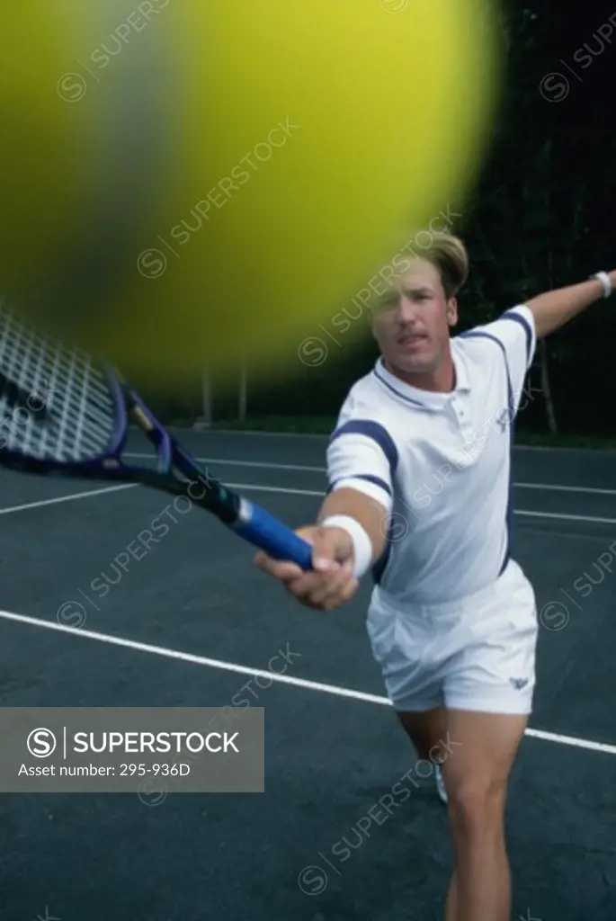 Young man playing tennis