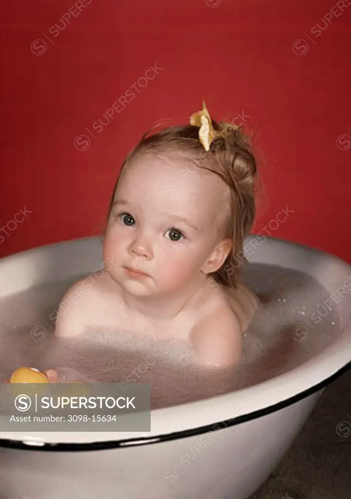 Portrait of a girl in a bathtub