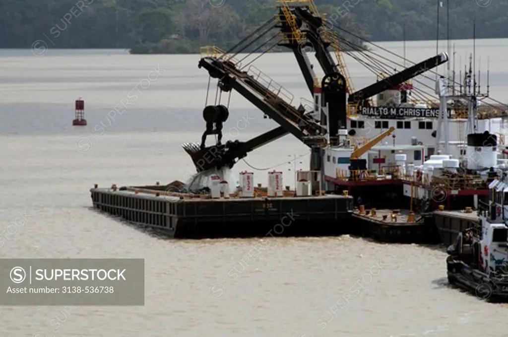 Barge with a dipper dredger in canal, Gatun Lake, Panama Canal, Panama