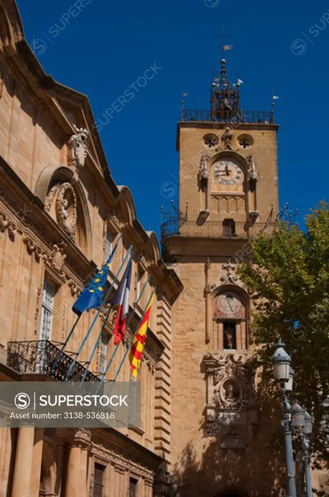 Low angle view of a clock tower, Cours Mirabeau, Aix-en-Provence, Bouches-du-Rhone, Provence-Alpes-Cote d'Azur, France