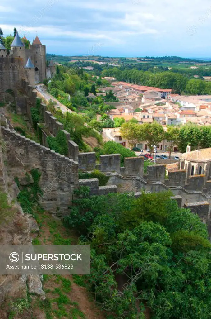 High angle view of a fortress with cityscape, Carcassonne, Aude, Languedoc-Rousillon, France