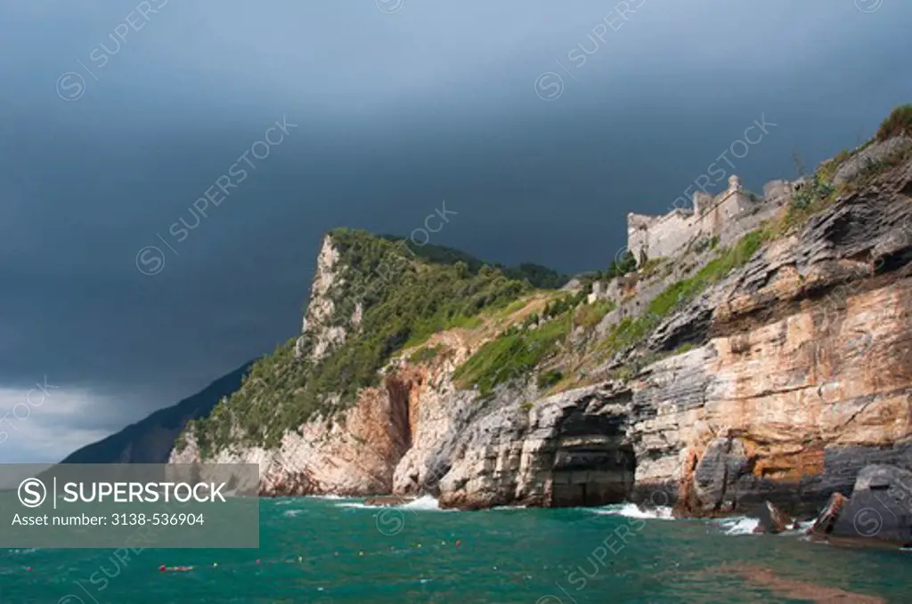 Storm clouds over the sea and cliff, Doria Castle, Portovenere, La Spezia Province, Liguria, Italy