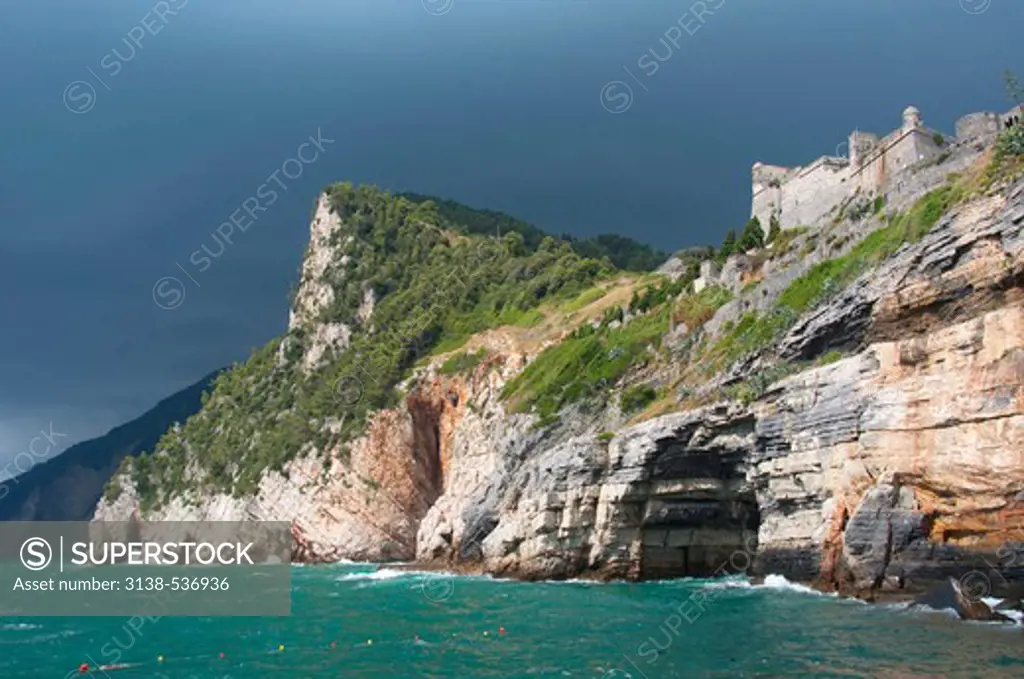 Storm clouds over the sea and cliff, Doria Castle, Portovenere, La Spezia Province, Liguria, Italy