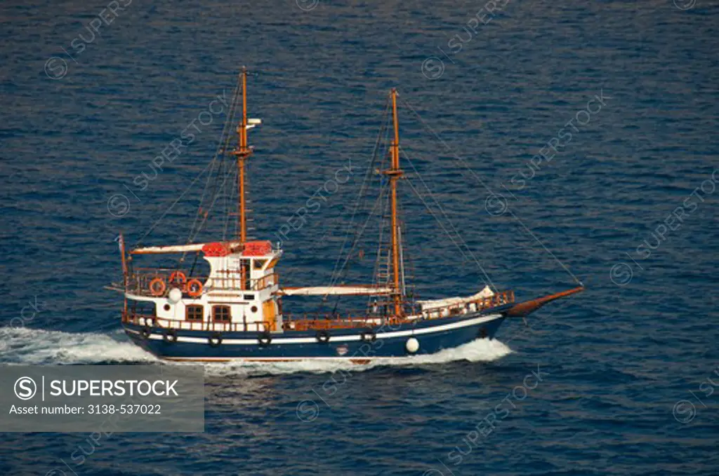 Boat in the sea, Santorini, Cyclades Islands, Greece