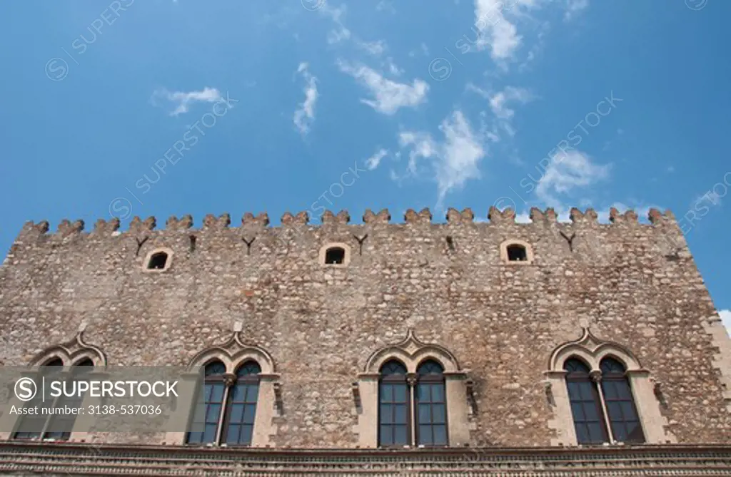 Low angle view of a palace, Palazzo Corvaja, Taormina, Sicily, Italy
