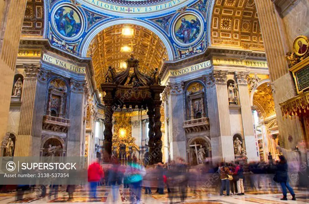 Tourists congregate before the chancel, St. Peter's Basilica, Vatican City