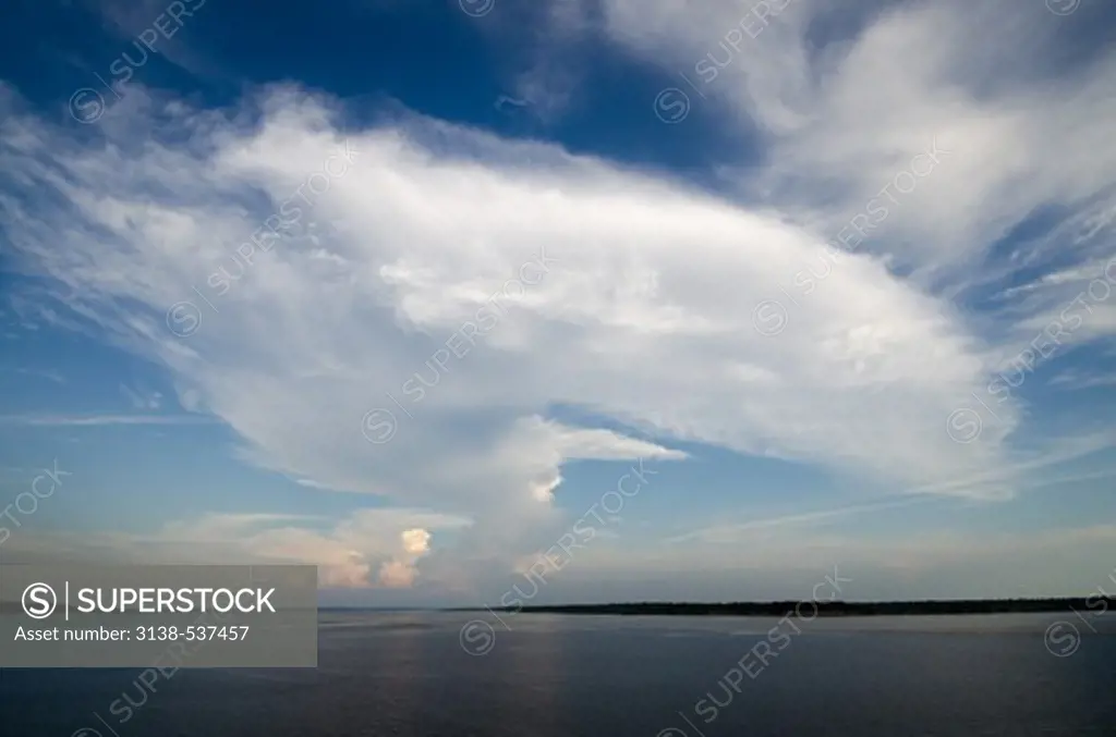 Huge cloud over the Amazon River, Brazil