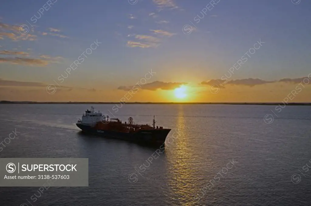 Oil tanker in the ocean at sunset, Rio Grande Do Sul State, Brazil