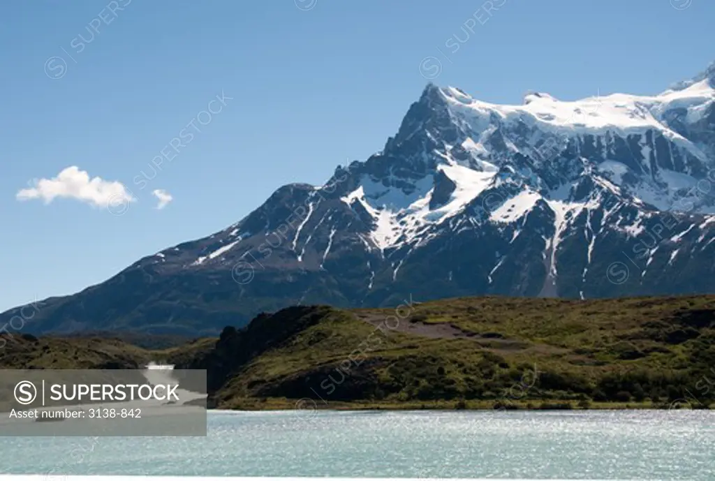 Mountain covered with snow at the seaside, Torres Del Paine National Park, Patagonia, Chile